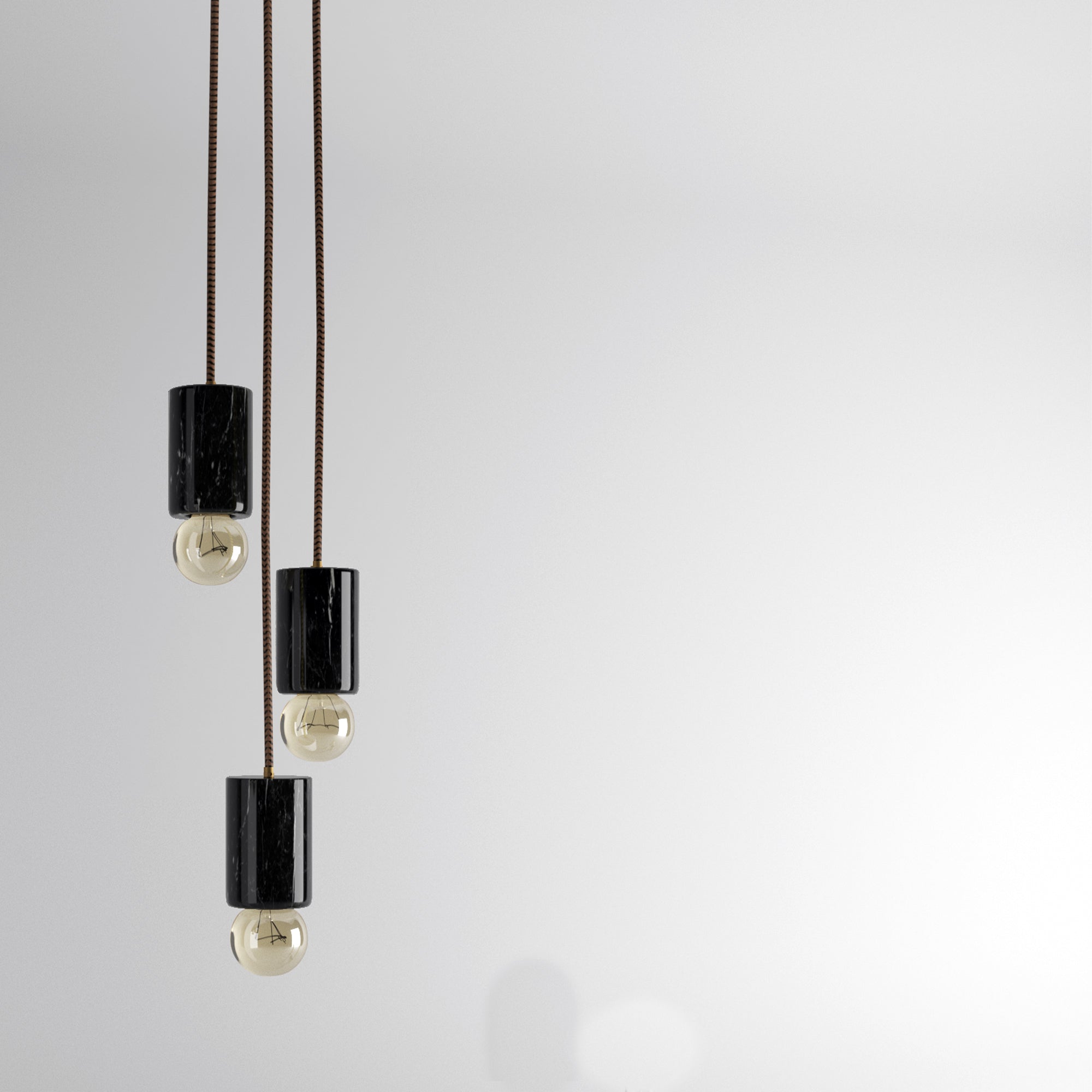 Lampadario in Marmo Nero Marquina - Eleganza Artigianale per la Tua Casa