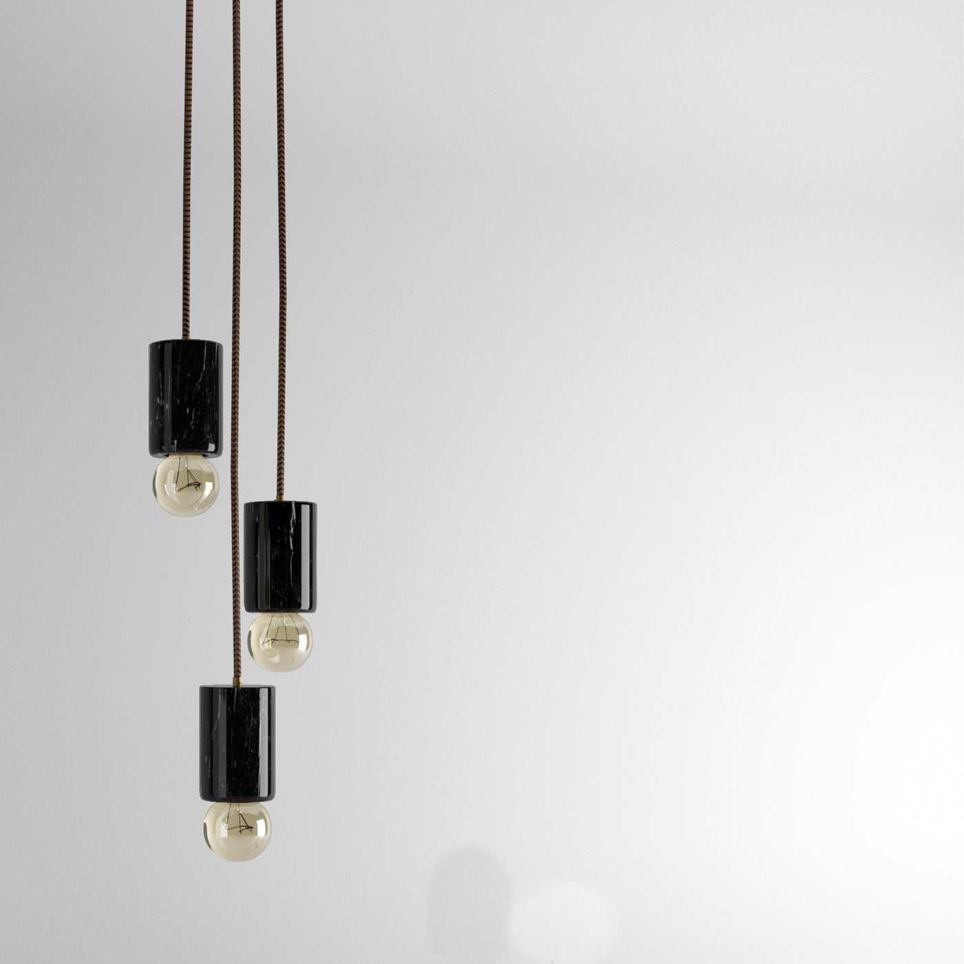 Lampadario in Marmo Nero Marquina - Eleganza Artigianale per la Tua Casa