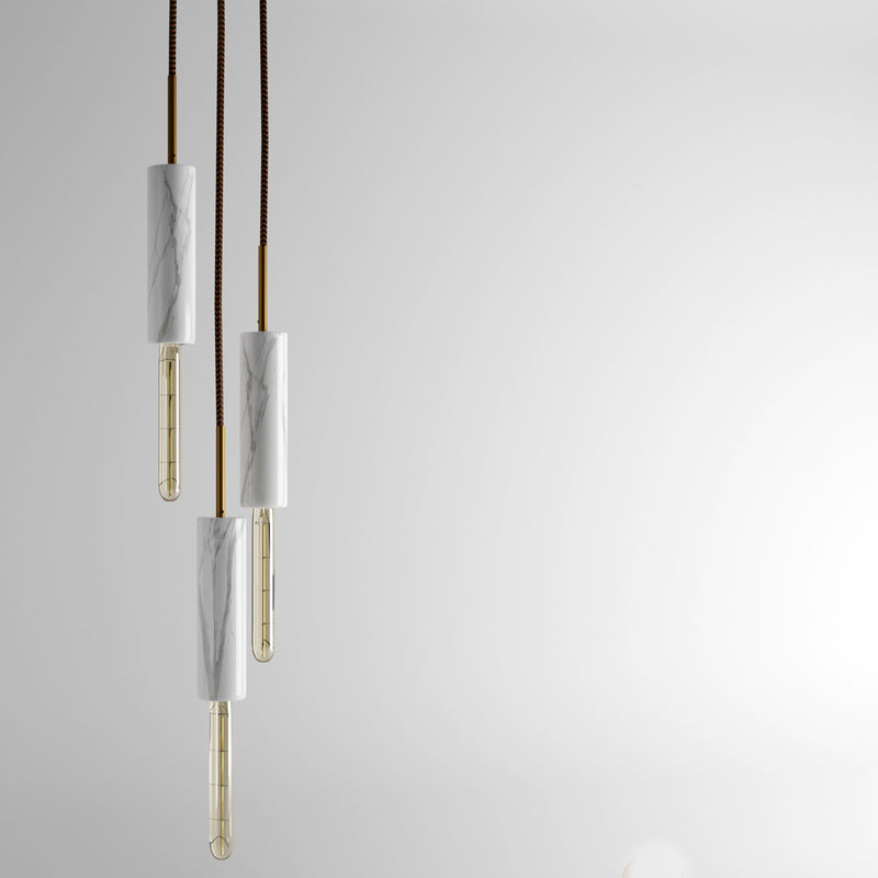 Lampadario in Marmo Statuario con venature uniche, illuminazione elegante per la casa.